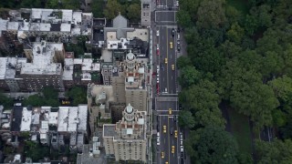 AX86_053 - 4K aerial stock footage tilt to a bird's eye view of The San Remo apartment building, Upper West Side, New York City