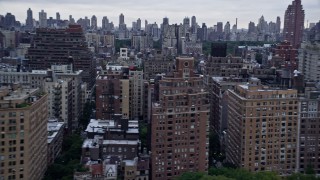 AX86_065 - 4K aerial stock footage flyby apartment complexes, Upper West Side, New York City