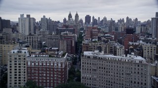 AX86_066 - 4K aerial stock footage flyby apartment buildings, Upper West Side, New York City