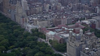 AX86_080 - 4K aerial stock footage pan across the Upper West Side to reveal Natural History Museum, New York City