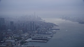 AX86_082 - 4K aerial stock footage of Lower Manhattan seen from Hudson River, New York City