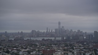 AX86_085 - 4K stock footage aerial video a wide view of Lower Manhattan, New York City, seen from Jersey City