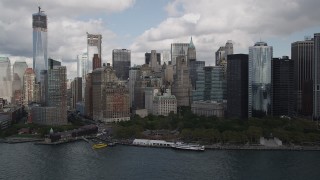 AX87_016 - 4K stock footage aerial video Approaching Lower Manhattan skyscrapers, Battery Park, New York, New York