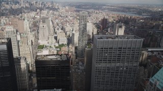 AX87_018 - 4K aerial stock footage Fly over Lower Manhattan, toward 8 Spruce Street, New York, New York