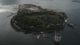 AX87_041 - 4K aerial stock footage Flying by Governors Island, New York Bay, New York, New York