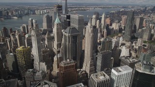 AX87_049 - 4K stock footage aerial video Flying over Lower Manhattan skyscrapers, New York, New York