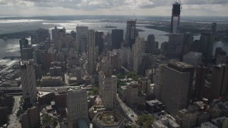 AX87_056 - 4K aerial stock footage Flying over Lower Manhattan, approaching 8 Spruce Street, New York, New York