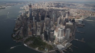 AX87_064 - 4K aerial stock footage Tilt up to reveal Lower Manhattan from a high altitude, New York, New York