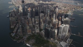 AX87_065 - 4K aerial stock footage Flying by Lower Manhattan, at a high altitude, New York, New York