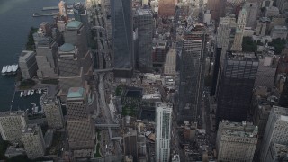 AX87_068 - 4K aerial stock footage Approaching World Trade Center Memorial, Lower Manhattan, New York, New York
