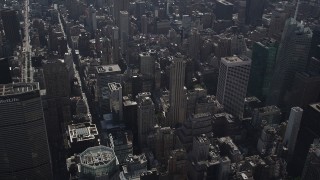 AX87_083 - 4K aerial stock footage Tilt up from Waldorf-Astoria, revealing Midtown Manhattan, New York, New York
