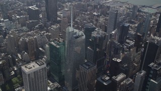 AX87_084 - 4K aerial stock footage Approach Bank of America Tower, Midtown Manhattan, New York, New York