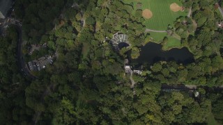 AX87_121 - 4K aerial stock footage Bird's eye view over Delacorte Theater, Turtle Pond, Central Park, New York
