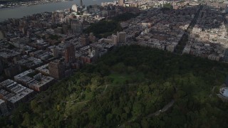 AX87_124 - 4K aerial stock footage Panning left to Upper West Side buildings, Central Park, New York, New York