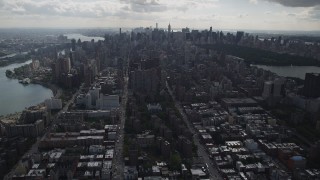 AX87_133 - 4K aerial stock footage Flying over apartment buildings, Upper East Side, Midtown Manhattan, New York