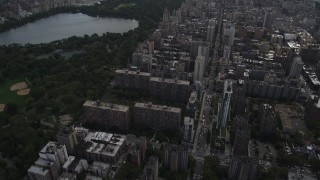 AX87_140 - 4K aerial stock footage Tilting from Upper West Side, Midtown Manhattan, Central Park, New York