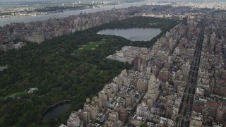 AX87_153 - 4K stock footage aerial video Fly over Upper East Side, Central Park, Metropolitan Museum of Art, New York