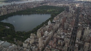 AX87_155 - 4K stock footage aerial video Flying over Upper East Side, Central Park, New York, New York