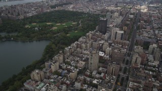 AX87_156 - 4K aerial stock footage Flying over Upper East Side buildings, Central Park, New York, New York