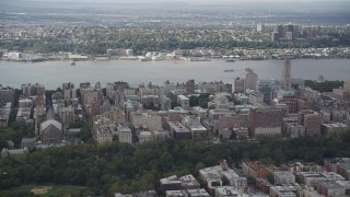 AX87_158 - 4K aerial stock footage Flying over Columbia University, views of Hudson River, New York, New York