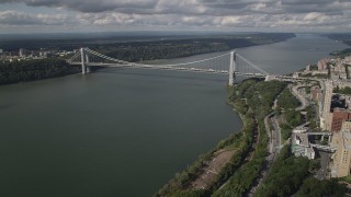 AX87_161 - 4K stock footage aerial video Henry Hudson Parkway, George Washington Bridge, Hudson River, New York