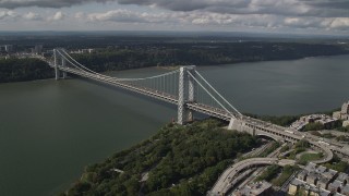 AX87_162 - 4K stock footage aerial video Henry Hudson Parkway, George Washington Bridge, Hudson River, New York