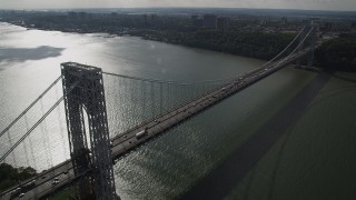 AX87_165 - 4K aerial stock footage Flying by the George Washington Bridge, Hudson River, New York, New York