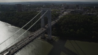 AX87_167 - 4K aerial stock footage Fly by George Washington Bridge, Hudson River, toward New Jersey, New York