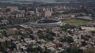 AX87_176 - 4K aerial stock footage Flying by Yankee Stadium, Bronx, New York