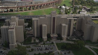 AX87_184 - 4K stock footage aerial video Flying by the Manhattan Psychiatric Center, Wards Island, New York, New York