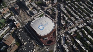 AX88_014 - 4K aerial stock footage of approaching Barclays Center, tilt to bird's eye view of arena, Brooklyn, New York