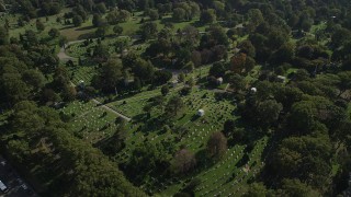 AX88_023 - 4K aerial stock footage of grave markers at Green-Wood Cemetery in Brooklyn, New York