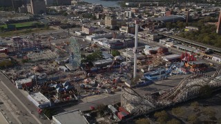 AX88_056 - 4K aerial stock footage of flying by Luna Park rides in Coney Island, Brooklyn, New York, New York