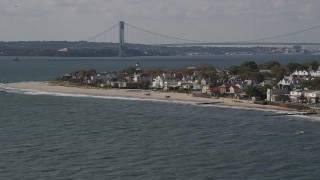 AX88_066 - 4K aerial stock footage of upscale beachfront homes in Coney Island, Brooklyn, New York