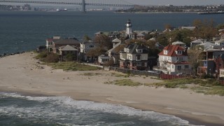 AX88_069 - 4K aerial stock footage of beachfront homes in Coney Island, Brooklyn, New York, New York