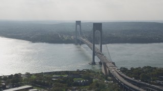 AX88_079 - 4K aerial stock footage flyby the Verrazano-Narrows Bridge and The Narrows, seen from Brooklyn, New York