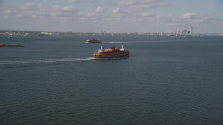 AX88_092 - 4K aerial stock footage track a Staten Island Ferry sailing New York Harbor, New York, New York