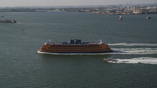 AX88_095 - 4K aerial stock footage track a Staten Island Ferry sailing New York Harbor, New York, New York