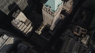 AX88_119 - 4K stock footage aerial video of a bird's eye view of 40 Wall Street in Lower Manhattan, New York, New York