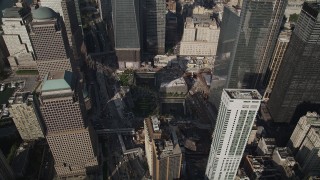 AX88_133 - 4K aerial stock footage flyby skyscrapers and World Trade Center Memorial in Lower Manhattan, New York