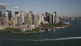 AX88_157 - 4K stock footage aerial video of flying by Battery Park and Lower Manhattan skyscrapers, New York, New York