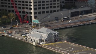 AX88_161 - 4K aerial stock footage of the Downtown Manhattan Heliport in Lower Manhattan, New York