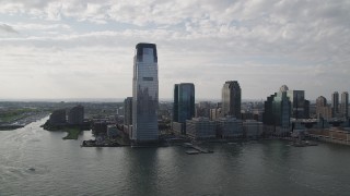 AX88_166 - 4K aerial stock footage of approaching Goldman Sachs Tower skyscraper, Downtown Jersey City, New Jersey