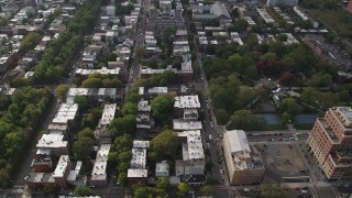 AX88_170 - 4K stock footage aerial video of flying over row houses by Hamilton Park, Jersey City, New Jersey