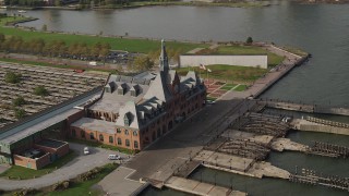 AX88_177 - 4K aerial stock footage of orbiting Central Railroad Terminal in Jersey City, New Jersey
