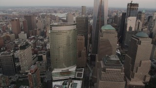 AX89_024 - 4K aerial stock footage of World Trade Center, 200 West Street, Lower Manhattan, New York, sunset