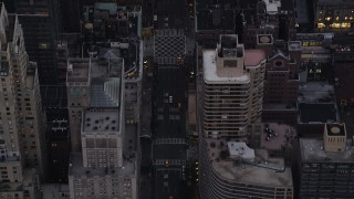 AX89_071 - 4K aerial stock footage Flying over 7th Avenue, Midtown Manhattan, New York, New York, twilight