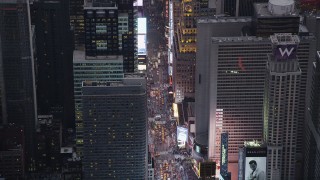 AX89_073 - 4K aerial stock footage Approaching Times Square, Midtown Manhattan, New York, New York, twilight