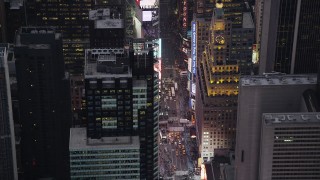 AX89_074 - 4K aerial stock footage Approaching Times Square, Midtown Manhattan, New York, twilight