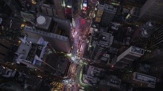 AX89_085 - 4K aerial stock footage Bird's eye view over Times Square, Midtown Manhattan, New York, twilight